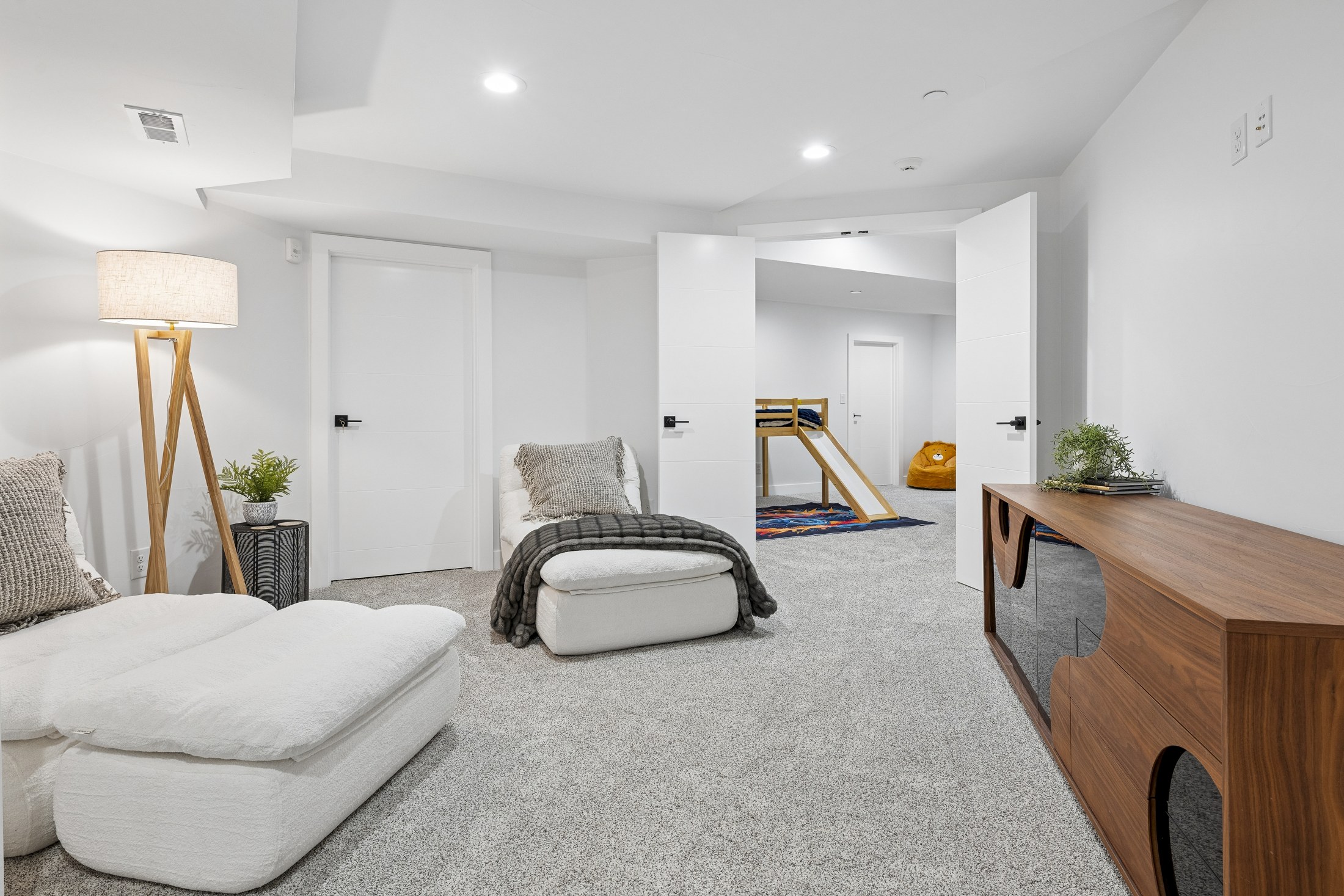 After · Completed Basement Lounge