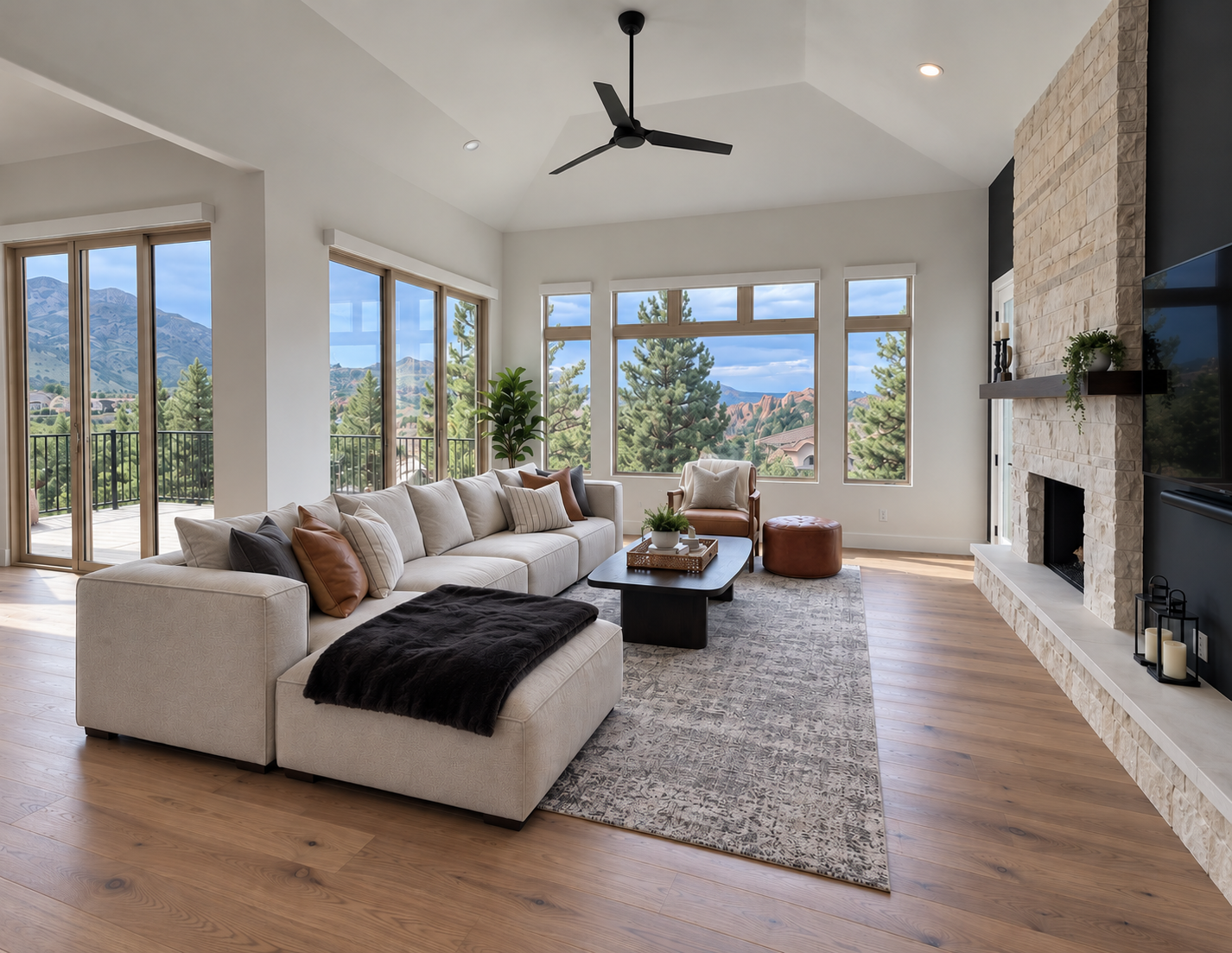 Elk living room with vaulted ceiling, patio doors and fireplace