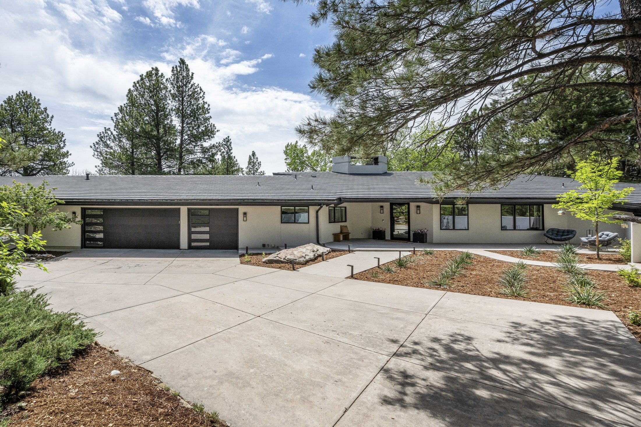 Finished home nestled among mature trees
